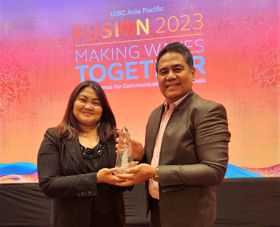 BCDA representatives posing with the trophy